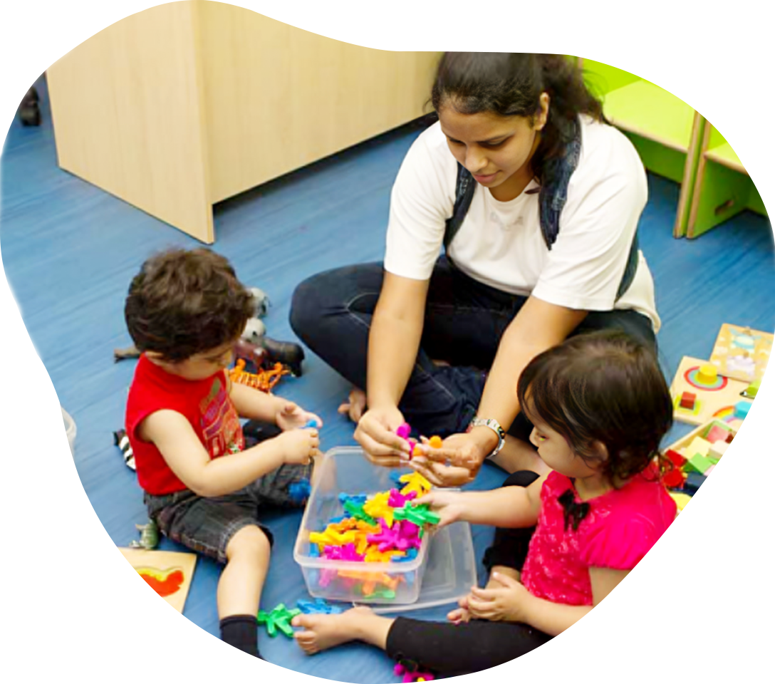 Teacher and child drawing together